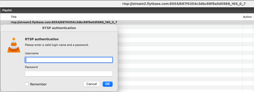 VLC RTSP authentication pop-up showing username and password fields with Remember checkbox