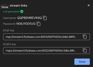 Generated streaming links showing Username, Password, RTSP link, and RTSPS link with copy buttons